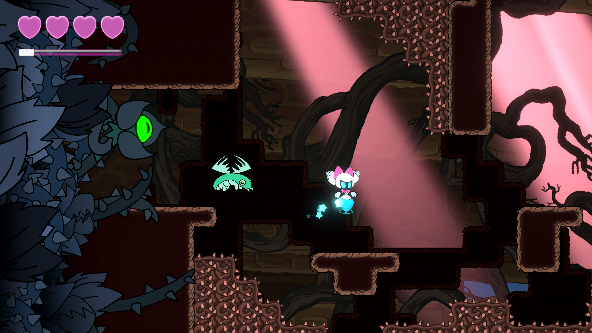 The player exploring a spiked cavern with a glowing enemy nearby